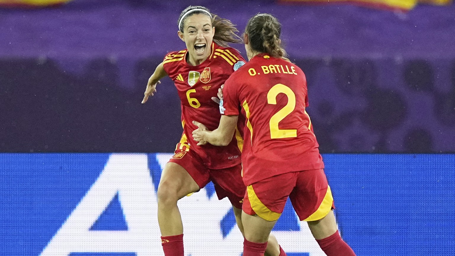 Spain&#039;s Aitana Bonmati, left, celebrates with Spain&#039;s Ona Batlle after scoring her sides first goal during the Women&#039;s Euro 2025 semifinals soccer match between Germany and Spain at Sta ...