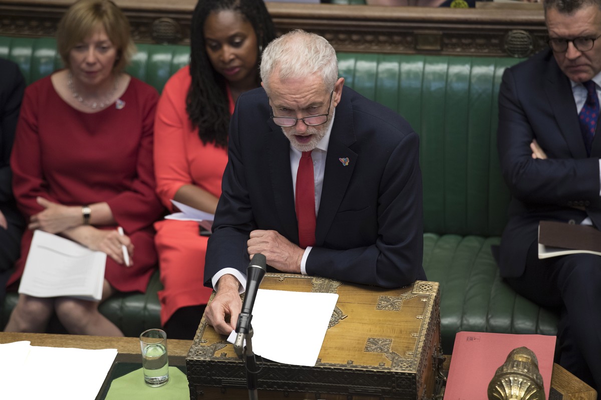 epa07658450 A handout photo made available by the UK Parliament shows British Labour party opposition leader Jeremy Corbyn (C) during Prime Minister's Questions (PMQs) at the House of Commons in  ...