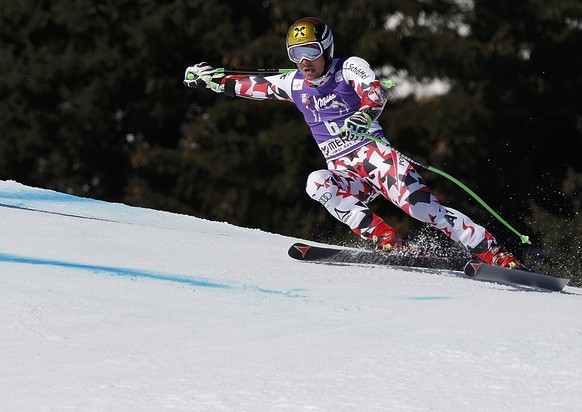 Marcel Hirscher of Austria skis during the men&#039;s Super G race at the Alpine Skiing World Cup Finals in Meribel, in the French Alps, March 19, 2015. REUTERS/Christian Hartmann