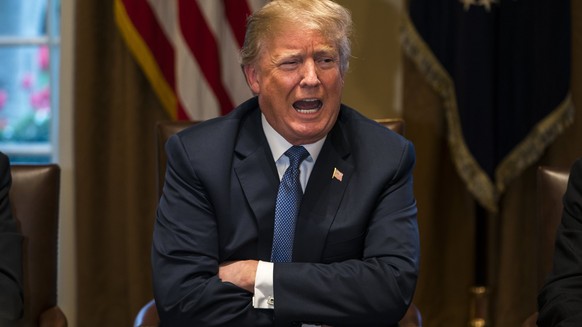 epa06658030 US President Donald J. Trump speaks with the media before a meeting with his military leadership in the Cabinet Room of the White House in Washington DC, USA, 09 April 2018. Trump said he  ...