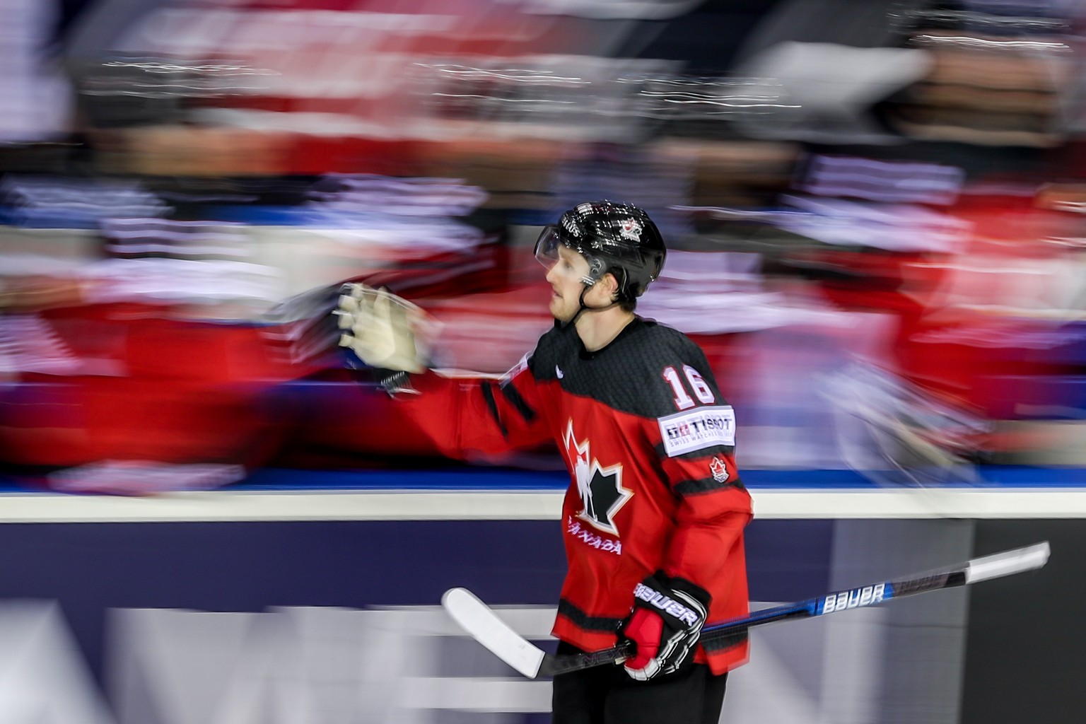 epa07590293 Jared McCann of Canada celebrates his goal with team mates during the IIHF World Championship group A ice hockey match between Canada and USA at the Steel Arena in Kosice, Slovakia, 21 May ...