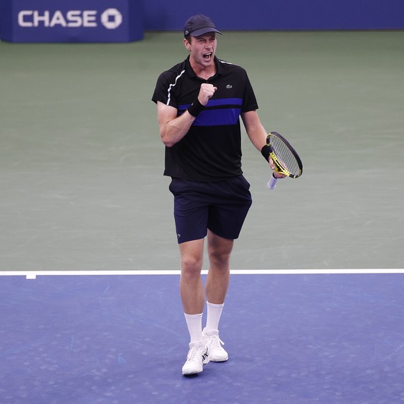 epa09450307 Botic Van De Zandschulp of the Netherlands reacts after defeating Diego Schwartzman of Argentina during their match on the seventh day of the US Open Tennis Championships the USTA National ...