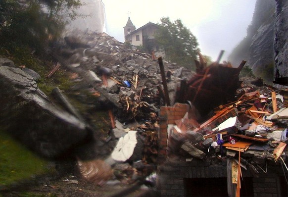 General view of the Swiss village of Gondo after heavy rain flooded the village, on Sunday, October 15, 2000. At least three people died in the village of Gondo on the Swiss-Italian border. About 15 p ...