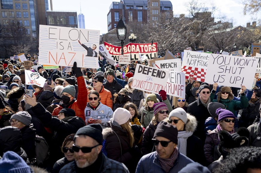 epa11903627 Demonstrators gather in Washington Square Park during a protest against recent Trump&#039;s administration policies and actions in New York, New York, USA, 17 February 2025. Rallies have b ...