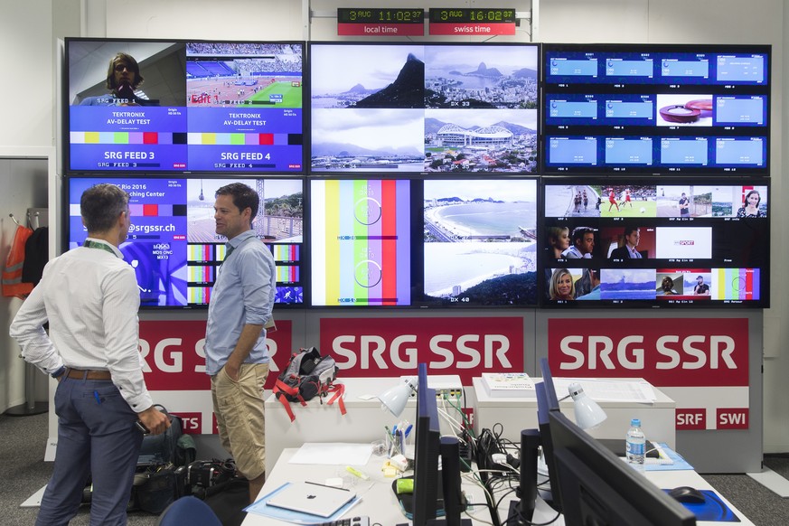 Moderator Lukas Studer, right, and Roland Maegerle, chief sport departement of the Swiss National Broadcasting Company SRG SSR, right, are pictured during a media tour at the TV-Studio at Ipanema Beac ...