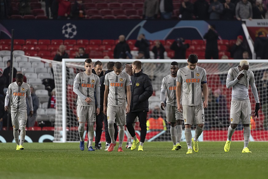 Young Boys&#039; players leave the pitch after the UEFA Champions League Group H matchday 5 soccer match between England&#039;s Manchester United FC and Switzerland&#039;s BSC Young Boys in the Old Tr ...