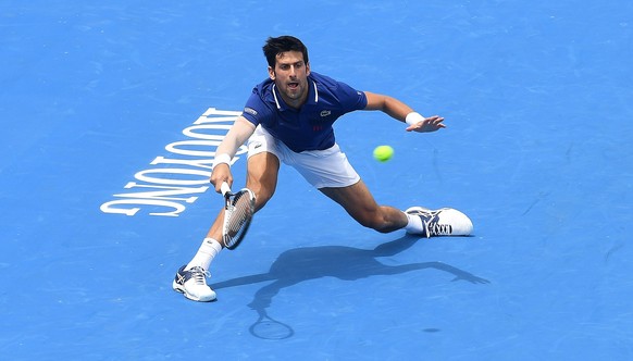 epa06428086 Novak Djokovic of Serbia in action against Dominic Thiem of Austria during match two of the Kooyong Classic tennis tournament at Kooyong Lawn Tennis Club in Melbourne, Victoria, Australia, ...