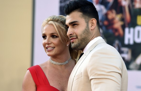 FILE - Britney Spears and Sam Asghari arrive at the Los Angeles premiere of &quot;Once Upon a Time in Hollywood,&quot; at the TCL Chinese Theatre, Monday, July 22, 2019. Spears, less than five months  ...