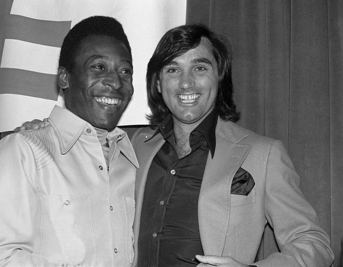 FILE - An April 7, 1978 file photo showing Pele, left, and former Irish soccer star George Best, smiling together during an awards luncheon for Pele in Los Angeles. Approaching the tenth anniversary o ...