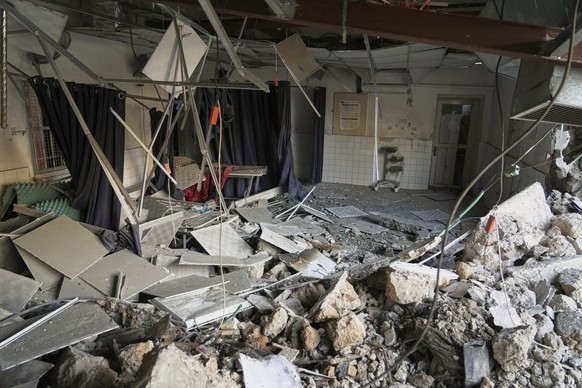 The outpatient and laboratory wards of the Al-Ahli Arab Baptist hospital are seen after being hit by an Israeli army strike late Saturday, following a warning issued by the army to evacuate patients,  ...
