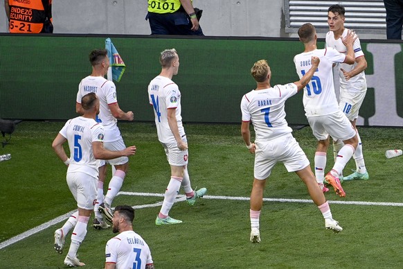 epa09306019 Czech players celebrate their second goal during the UEFA EURO 2020 round of 16 soccer match between the Netherlands and the Czech Republic in Budapest, Hungary, 27 June 2021. EPA/Zsolt Sz ...