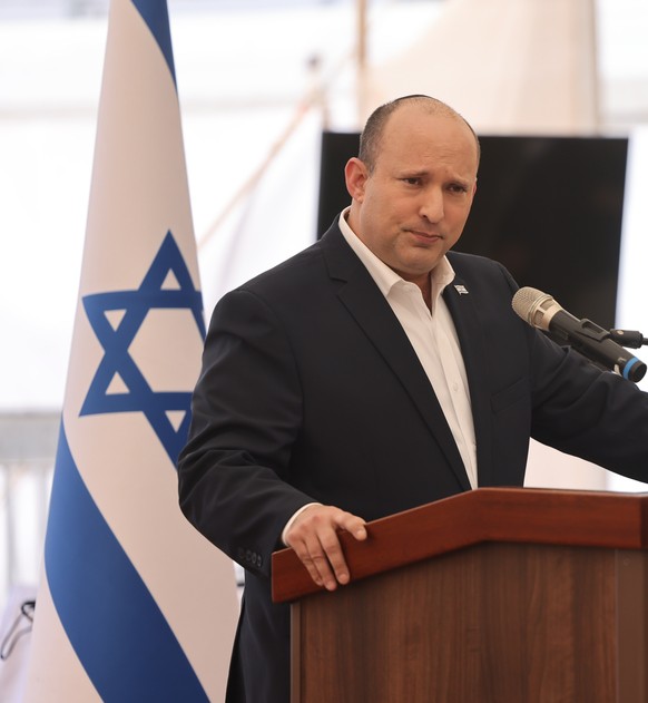 epa09871828 Israeli Prime Minister Naftali Bennett speaks at an Israeli military base in the settlement of Beit El in the West Bank, 05 April 2022. Bennett addressed the high security tension and rece ...
