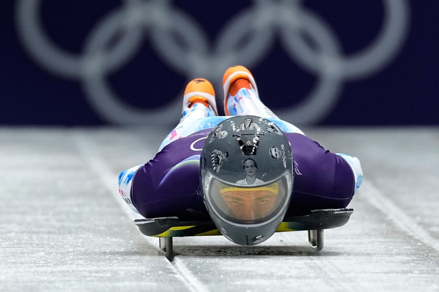 Ukraine's Vladyslav Heraskevych starts for a men's skeleton training session at the 2026 Winter Olympics, in Cortina d'Ampezzo, Italy, Wednesday, Feb. 11, 2026. (AP Photo/Aijaz Rahi)
Vl ...