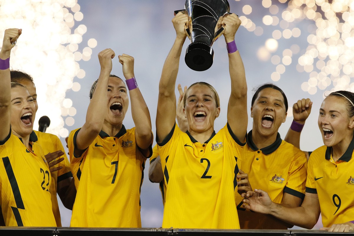 epa10483234 Matildas players Steph Catley (2-L), Courtney Nevin (C), and Sam Kerr (2-R) celebrate winning the cup of nations after the 2023 Cup of Nations women's soccer match between Australia a ...