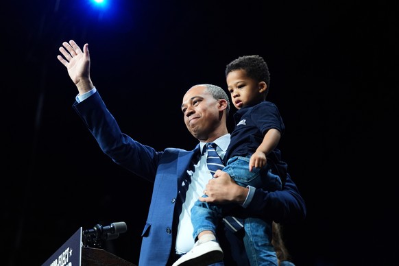Democrat Jay Jones waves to the crowd on stage at an election night watch party for Democrat Abigail Spanberger after Jones was declared the winner of the Virginia attorney general&#039;s race Tuesday ...