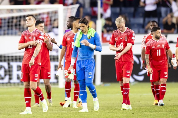 epa10700928 Switzerland&#039;s players react after the UEFA European Qualifiers match between Switzerland and Romania at the Swissporarena stadium in Lucerne, Switzerland, 19 June 2023. EPA/MICHAEL BU ...