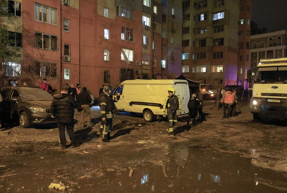 epa11696480 Ukrainian rescuers work at the site of a Russian missile strike on a residential area in Kharkiv, northeastern Ukraine, 01 November 2024, amid the Russian invasion. One police officer was ...