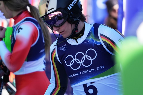 Germany's Lena Duerr reacts at the finish area of an alpine ski, women's slalom race, at the 2026 Winter Olympics, in Cortina d'Ampezzo, Italy, Wednesday, Feb. 18, 2026. (AP Photo/Jacqu ...