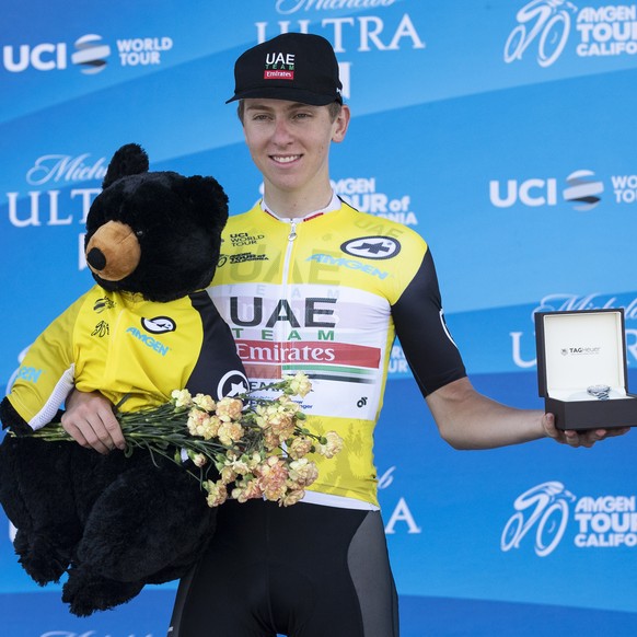 epa07583007 Overall 2019 AMGEN Tour of California race winner Tadej Pogacar celebrates after he crossed the finish line of the seventh and last stage at the Rose Bowl Stadium in Pasadena, California,  ...