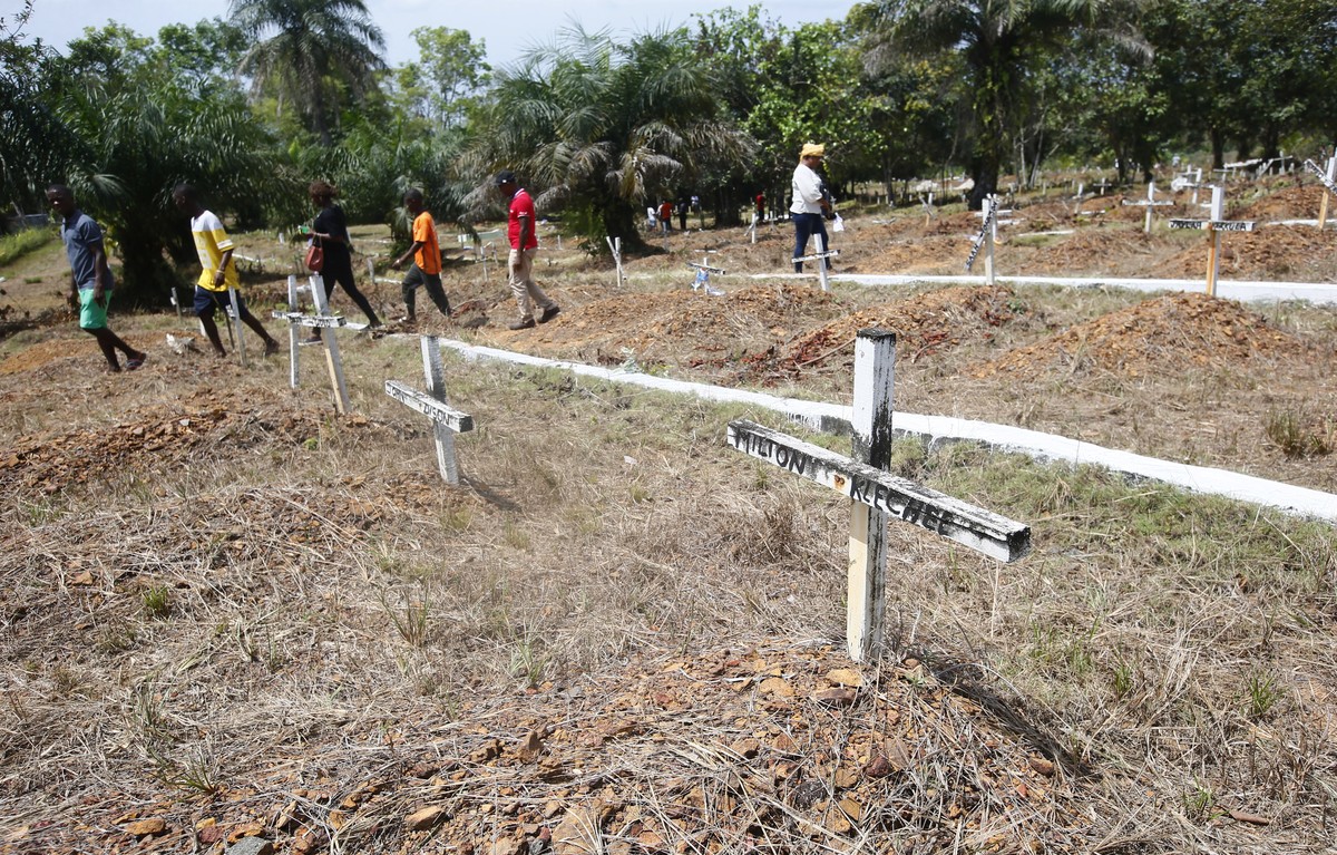 epa09066571 A general view of graves at the Disco Hill safe burial site in Margibi County, Liberia, 10 March 2021. The Disco Hill safe burial site was established for Ebola-related deaths in 2014. The ...