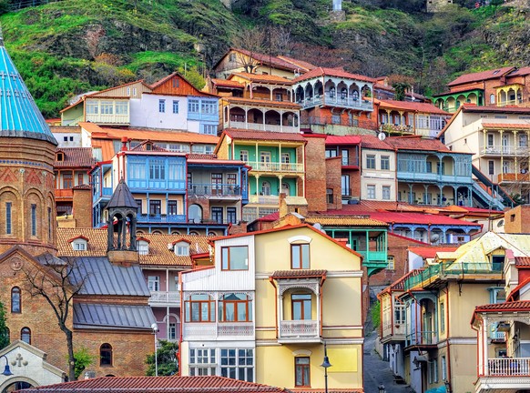 Colorful traditional houses with wooden carved balconies in the Old Town of Tbilisi, Georgia