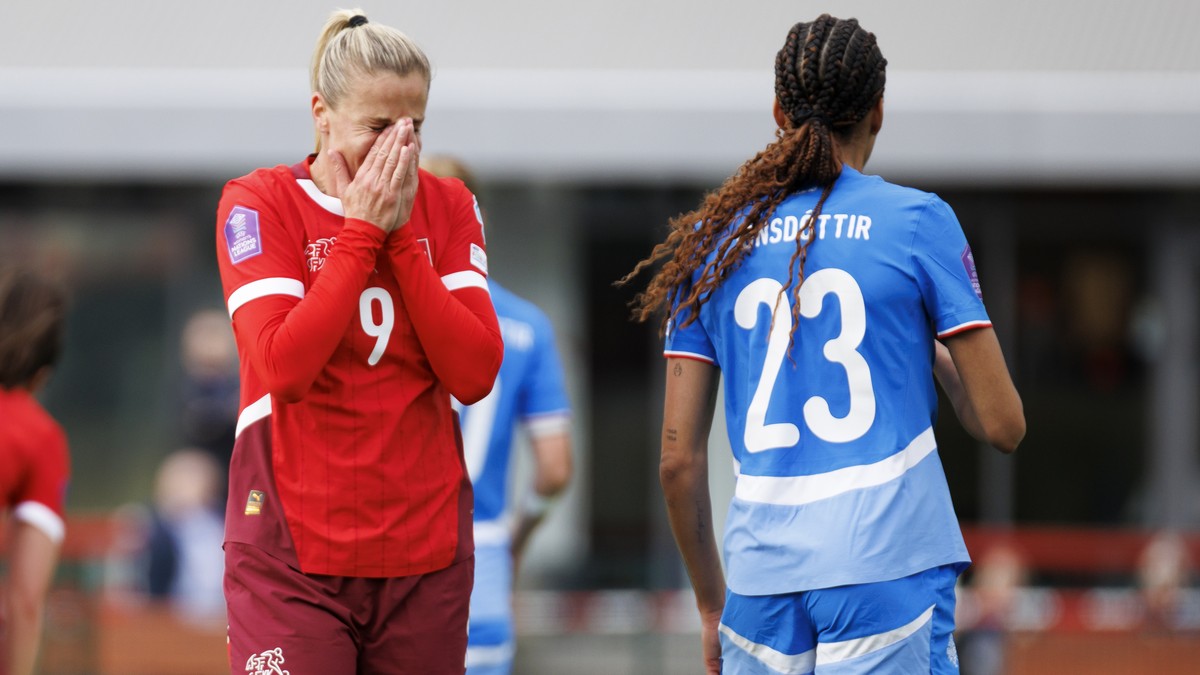 Switzerland's Ana-Maria Crnogorcevic, left, reacts next to Iceland's Sveindis Jonsdottir, right, during the UEFA women's Nations League group A2 soccer match between Iceland and Switzer ...