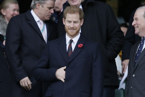 Britain&#039;s Prince Harry smiles before a rugby union international match between England and Argentina at Twickenham stadium in London, Saturday, Nov. 11, 2017. (AP Photo/Tim Ireland)