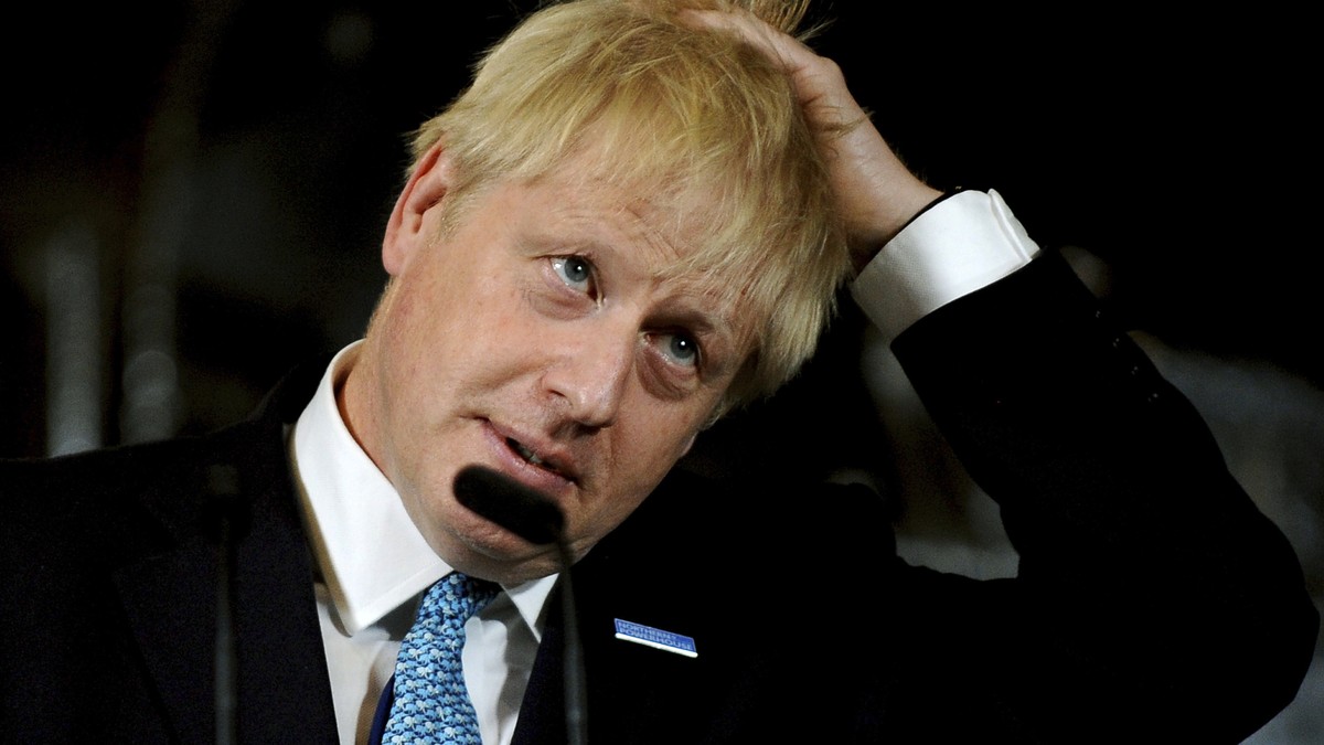 FILE - In this July 27, 2019, file photo, Britain's Prime Minister Boris Johnson reacts during a speech on domestic priorities at the Science and Industry Museum in Manchester, England. Johnson i ...