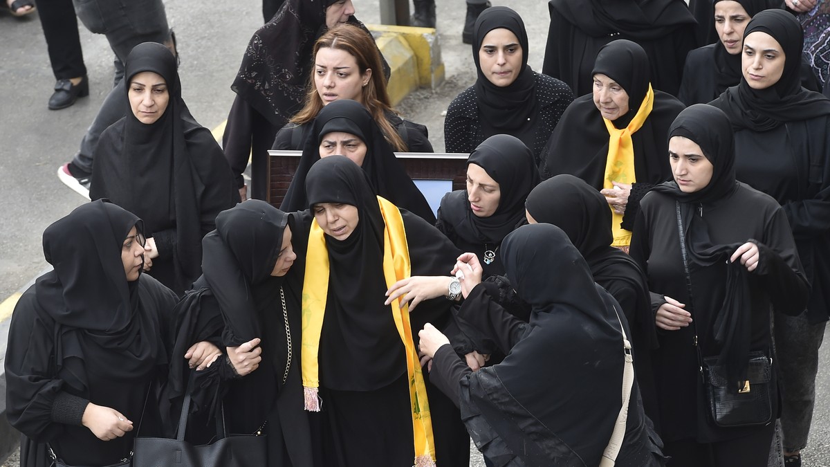 epa10969582 Supporters and relatives of Lebanese militant group Hezbollah attend the funeral of Hezbollah fighter Mohammed Assaf, who was killed in southern Lebanon, in the southern suburb of Beirut,  ...