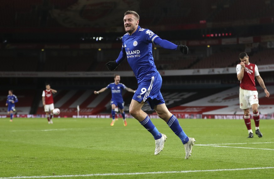 Leicester&#039;s Jamie Vardy celebrates after scoring his team&#039;s first goal during the English Premier League soccer match between Arsenal and Leicester City at Emirates Stadium in London, Englan ...