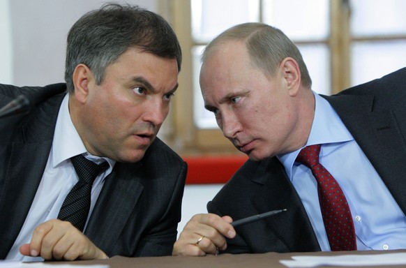FILE - In this Monday, May 23, 2011 file photo, then, Russian Prime Minister Vladimir Putin, right, speaks with his then Chief of Staff ,Vyacheslav Volodin, during a meeting of officials in Pskov, abo ...