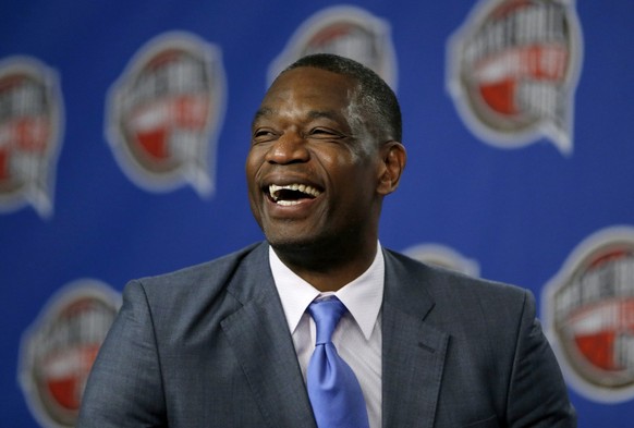 FILE - Former NBA basketball player Dikembe Mutombo laughs during a news conference announcing him as one of the 12 finalists of this year&#039;s hall of fame class during an event ahead of the NBA Al ...