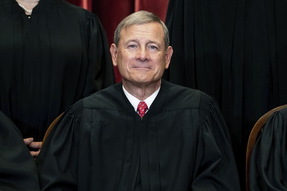 FILE - In this April 23, 2021, file photo Chief Justice John Roberts sits during a group photo at the Supreme Court in Washington. The Supreme Court on Friday rejected a plea from South Carolina to re ...