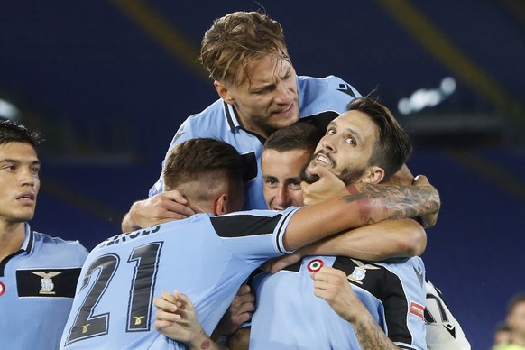 Lazio&#039;s Luis Alberto, right, celebrates with his teammates Sergej Milinkovic-Savic,Adam Marusic and Ciro Immobile, on top, after scoring his side&#039;s second goal during a Serie A soccer match  ...