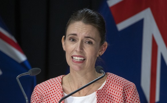 New Zealand Prime Minister Jacinda Ardern announces the country will move to red traffic light setting as part of new COVID-19 restrictions during a press conference in Wellington, Sunday, Jan. 23, 20 ...