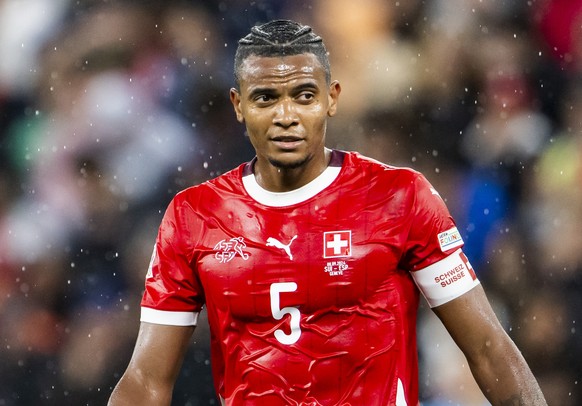 Switzerland&#039;s defender Manuel Akanji, left, Switzerland&#039;s forward Kwadwo Duah, center, and Switzerland&#039;s midfielder Fabian Rieder, right, react during the UEFA Nations League group A4 q ...