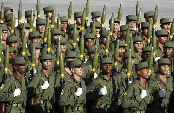 FILE - Cuban soldiers march during a military parade along the Revolution Square in Havana, Cuba, Dec. 2, 2006. (AP Photo/ Javier Galeano, File)
Trump Military Parade Global History