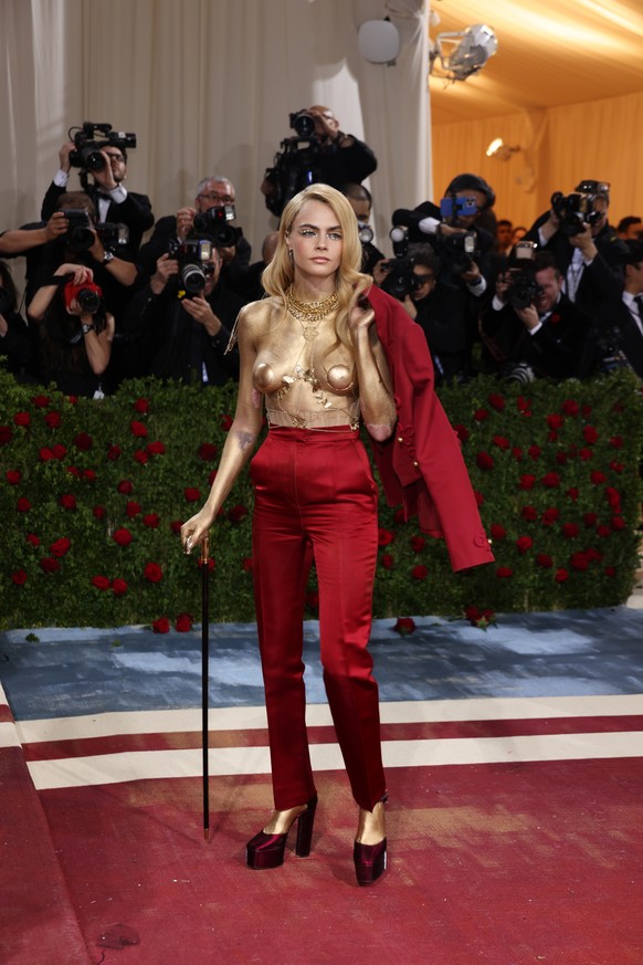 epa09923700 Cara Delevigne on the red carpet for the 2022 Met Gala, the annual benefit for the Metropolitan Museum of Art's Costume Institute, in New York, New York, USA, 02 May 2022. The event c ...