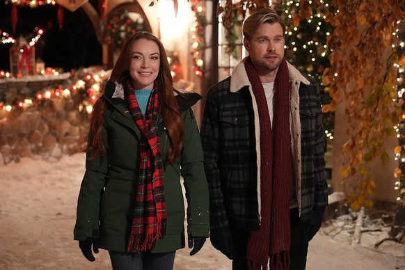 Lindsay Lohan and Chord Overstreet in Netflix&#039;s holiday rom-com &#039;Falling for Christmas.&#039;