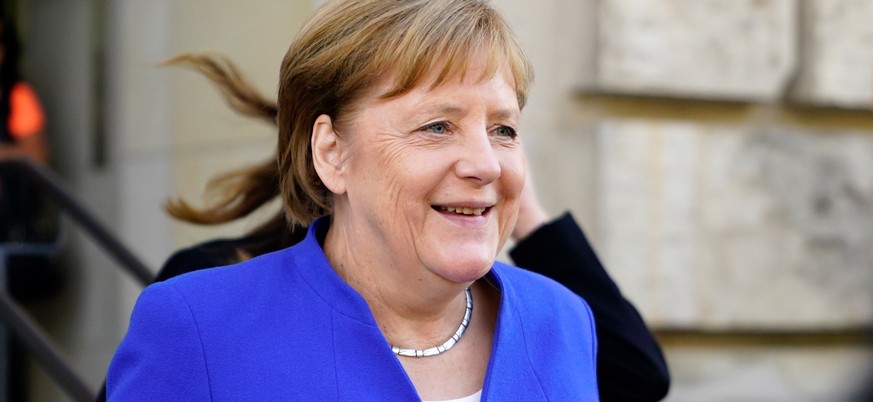 epa06858191 German Chancellor Angela Merkel of the Christian Democratic Union (CDU), leaves the Reichstag building, the seat of German Bundestag, in Berlin, Germany, 02 July 2018. According to media r ...