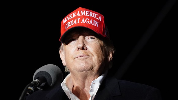 Former President Donald Trump pauses as he speaks at a rally Saturday, Jan. 15, 2022, in Florence, Ariz. (AP Photo/Ross D. Franklin)