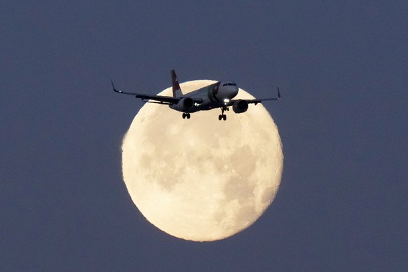 FILE - A TAP Air Portugal Airbus A320 is silhouetted against the setting moon while approaching for landing in Lisbon, Portugal, June 23, 2024. (AP Photo/Armando Franca, File)
Airbus Software Fix