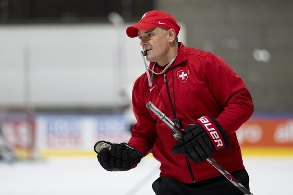 epa12953315 Head coach Jan Cadieux leads a training session of Switzerland's national ice hockey team at Swiss Life Arena in Zuerich, Switzerland 13 May 2026. Switzerland will host the ice hockey ...