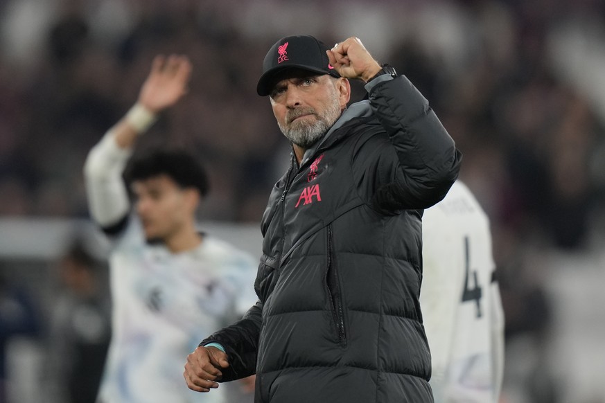 Liverpool&#039;s manager Jurgen Klopp celebrates towards his teams fans after the end of the English Premier League soccer match between West Ham United and Liverpool at the London stadium in London,  ...