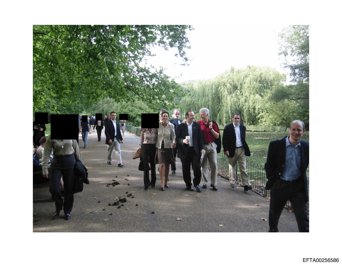 This undated, redacted photo released by the U.S. Department of Justice shows former President Bill Clinton with actor Kevin Spacey and Ghislaine Maxwell, walking with unknown people. (U.S. Department ...