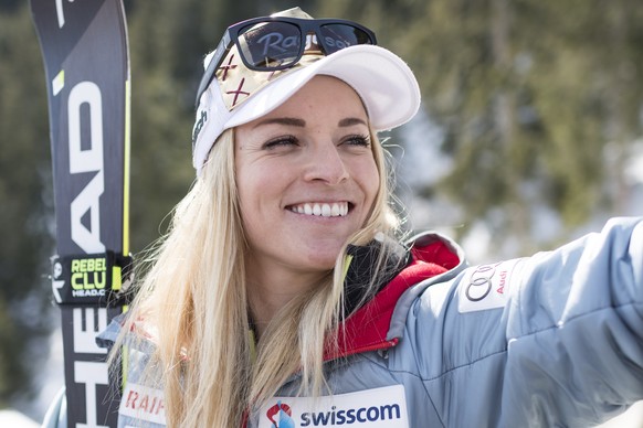 Lara Gut-Behrami of Switzerland comments in an interview her promotion from fourth to third place in the finish area after the women's Downhill race of the FIS Alpine Ski World Cup season in Crans-Mon ...