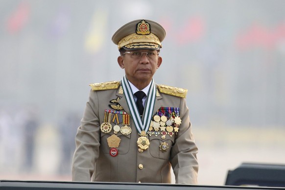 Myanmar&#039;s Commander-in-Chief Senior General Min Aung Hlaing presides an army parade on Armed Forces Day in Naypyitaw, Myanmar, Saturday, March 27, 2021. The army takeover in Myanmar a year ago th ...