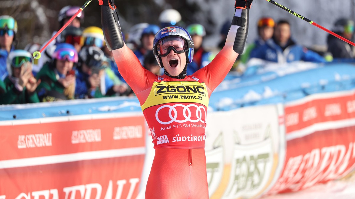 epa10373994 Winner Marco Odermatt of Switzerland celebrates in the finish area after the Men's Giant Slalom race of the Alpine Skiing World Cup in Alta Badia, Italy, 19 December 2022. EPA/ANDREA  ...