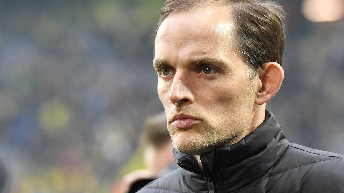 Dortmund's head coach Thomas Tuchel waits for the beginning of during the Champions League quarterfinal first leg soccer match between Borussia Dortmund and AS Monaco in Dortmund, Germany, Wednes ...