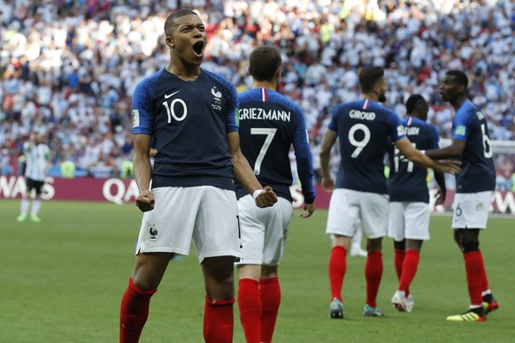 France&#039;s Kylian Mbappe celebrates after scoring his side&#039;s third goal during the round of 16 match between France and Argentina, at the 2018 soccer World Cup at the Kazan Arena in Kazan, Rus ...